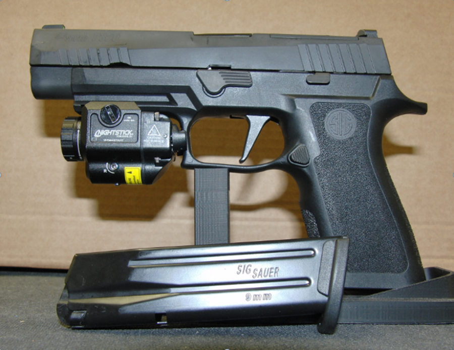 Pistola sigsauer policia nacional